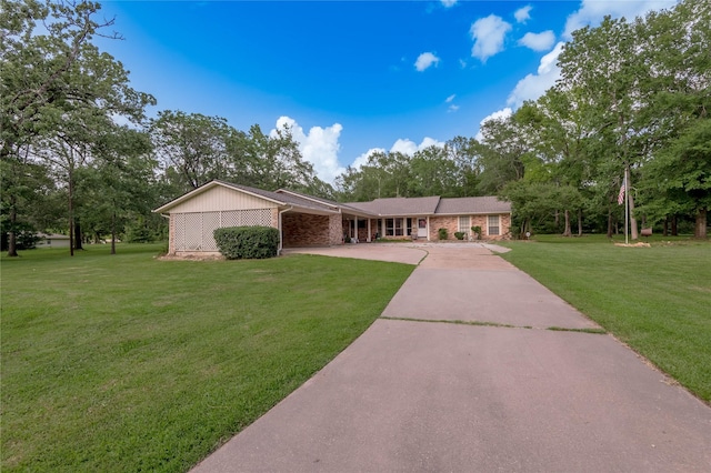 459 Brookwood Dr, Diboll, TX 75941 - ranch-style home with driveway, a front yard, and brick siding