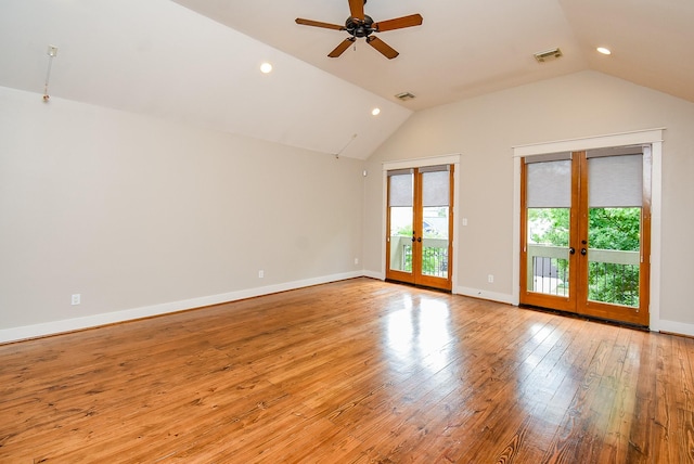 5238 Nett St, Houston, TX 77007 - empty room with french doors, healthy amount of natural light, a ceiling fan, lofted ceiling, and light wood-type flooring