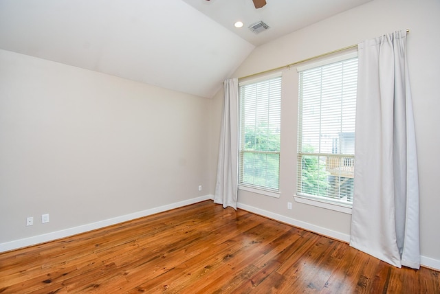 5238 Nett St, Houston, TX 77007 - empty room with ceiling fan, hardwood / wood-style floors, vaulted ceiling, and recessed lighting