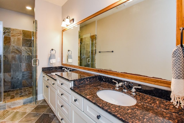 5238 Nett St, Houston, TX 77007 - bathroom featuring double vanity and a stall shower
