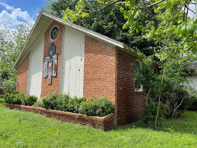 1815 Parker Rd, Houston, TX 77093 - view of home's exterior with brick siding and a lawn
