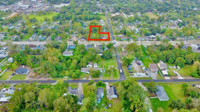 1815 Parker Rd, Houston, TX 77093 - aerial view of property and surrounding area with property parcel outlined and nearby suburban area