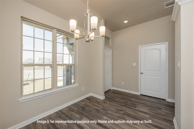 1414 Whitney Ln, Brenham, TX 77833 - unfurnished dining area with healthy amount of natural light, a chandelier, dark wood-style flooring, and recessed lighting