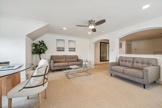 1518 Dunlavy St, Houston, TX 77006 - living area featuring a ceiling fan, arched walkways, recessed lighting, ornamental molding, and light carpet