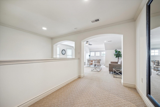 1518 Dunlavy St, Houston, TX 77006 - hallway featuring carpet, crown molding, arched walkways, and recessed lighting