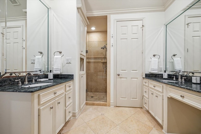 1518 Dunlavy St, Houston, TX 77006 - full bath with a shower stall, two vanities, tile patterned floors, crown molding, and recessed lighting