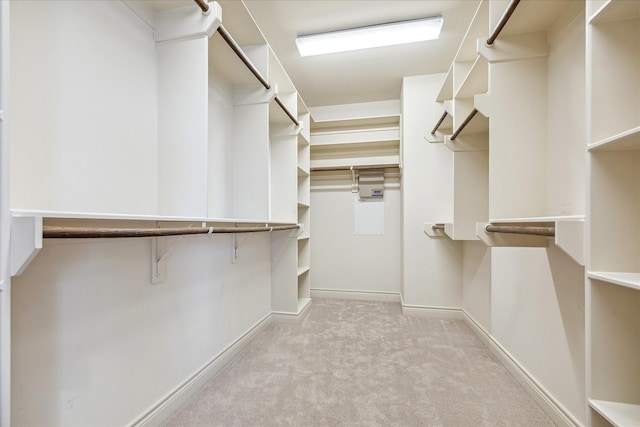 1518 Dunlavy St, Houston, TX 77006 - walk in closet featuring carpet flooring