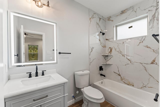 7007 Longmire Cir, Conroe, TX 77304 - bathroom with healthy amount of natural light, vanity, bathtub / shower combination, and wood finished floors