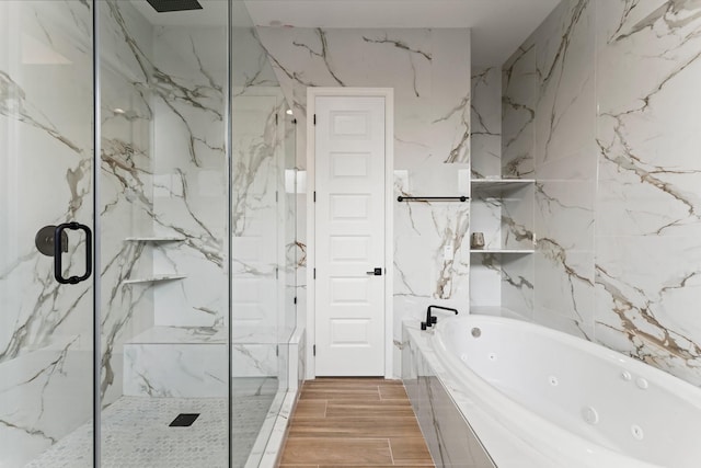 7007 Longmire Cir, Conroe, TX 77304 - bathroom featuring a tub with jets and a marble finish shower
