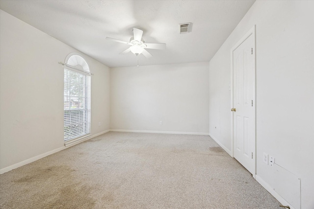 2016 Fairwood St, Pearland, TX 77581 - carpeted empty room featuring ceiling fan and baseboards