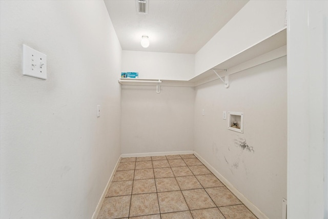 2016 Fairwood St, Pearland, TX 77581 - laundry room featuring washer hookup and light tile patterned floors