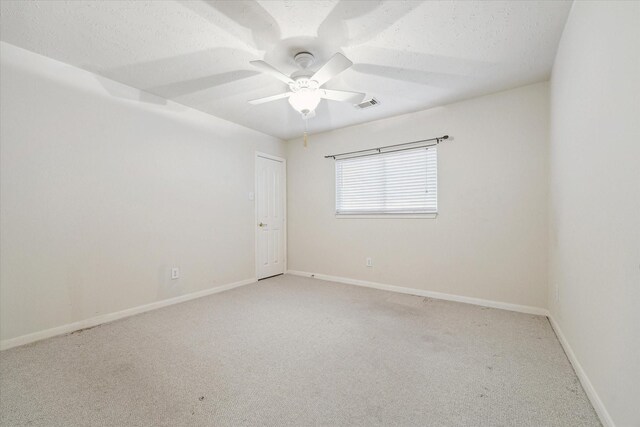 2016 Fairwood St, Pearland, TX 77581 - unfurnished room featuring light carpet, a textured ceiling, and ceiling fan