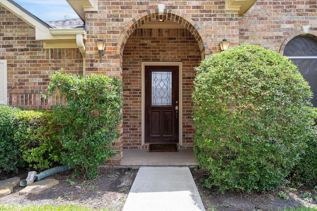 2016 Fairwood St, Pearland, TX 77581 - doorway to property with brick siding
