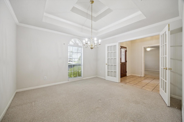 2016 Fairwood St, Pearland, TX 77581 - empty room with french doors, a raised ceiling, carpet flooring, a chandelier, and crown molding