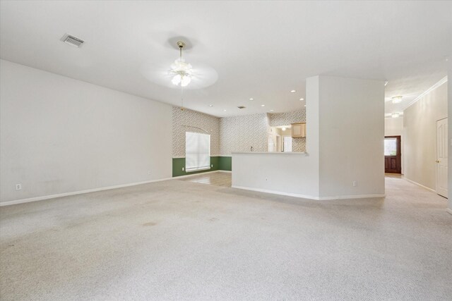 2016 Fairwood St, Pearland, TX 77581 - unfurnished living room featuring ceiling fan, plenty of natural light, and recessed lighting