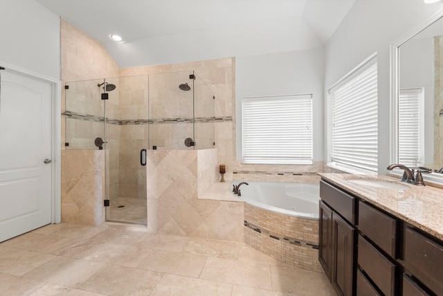 6531 Glenhill Dr, Spring, TX 77389 - full bathroom featuring lofted ceiling, a whirlpool tub, a shower stall, and vanity