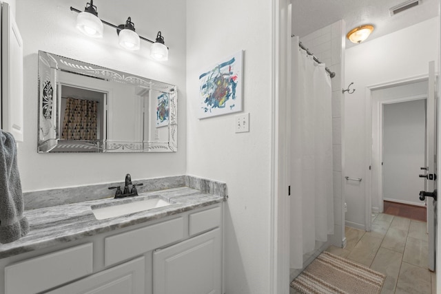 6531 Glenhill Dr, Spring, TX 77389 - full bathroom with vanity and curtained shower