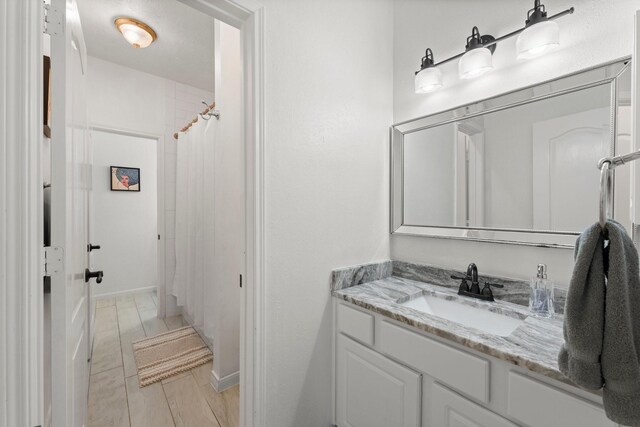 6531 Glenhill Dr, Spring, TX 77389 - bathroom featuring vanity and a shower with shower curtain