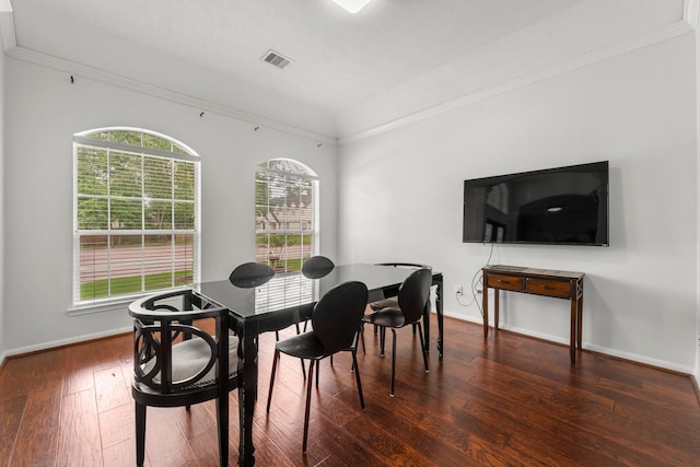 6531 Glenhill Dr, Spring, TX 77389 - dining room featuring healthy amount of natural light, hardwood / wood-style floors, and crown molding