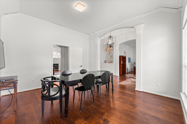 6531 Glenhill Dr, Spring, TX 77389 - dining room with ornate columns, crown molding, arched walkways, and wood finished floors
