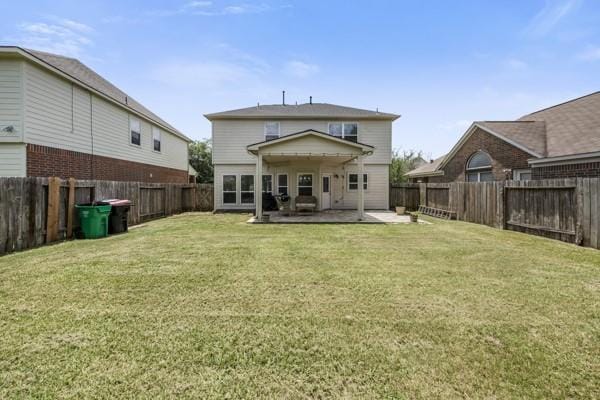19602 Hardwood Ridge Trl, Cypress, TX 77429 - rear view of property featuring a patio and a fenced backyard
