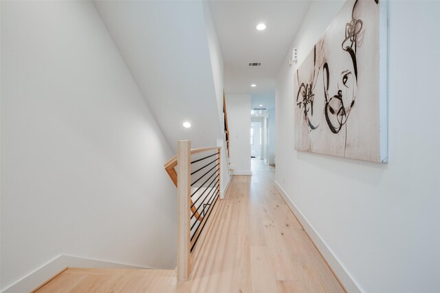2434 Quenby St, Houston, TX 77005 - hallway featuring an upstairs landing, recessed lighting, and light wood-style floors