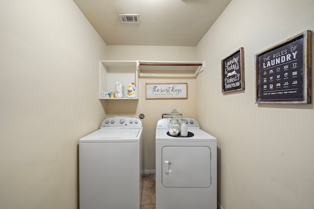 12311 Hawthorne Dr, Montgomery, TX 77356 - laundry room with washing machine and clothes dryer