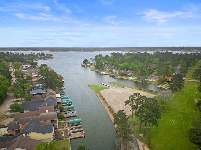12311 Hawthorne Dr, Montgomery, TX 77356 - aerial view of property and surrounding area featuring a large body of water and nearby suburban area