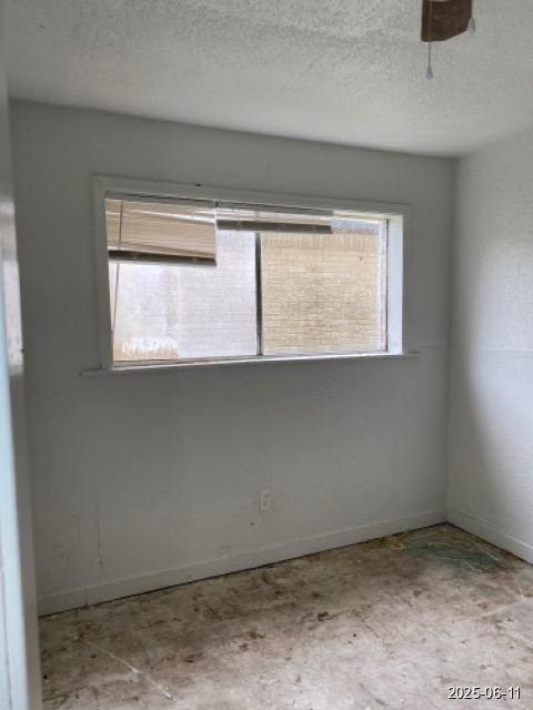 6605 Hogue St, Houston, TX 77087 - unfurnished room with a textured ceiling