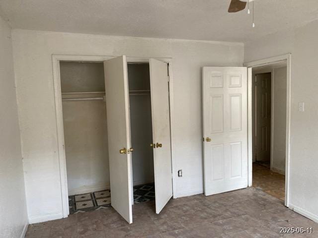 6605 Hogue St, Houston, TX 77087 - unfurnished bedroom with two closets and ceiling fan