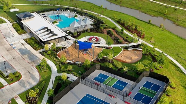 8910 Drysdale River Rd, Cypress, TX 77433 - bird's eye view of a pool and a nearby body of water