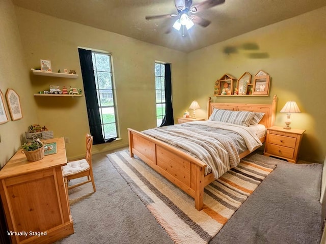 1215 Briar Ln, Wharton, TX 77488 - carpeted bedroom featuring a ceiling fan