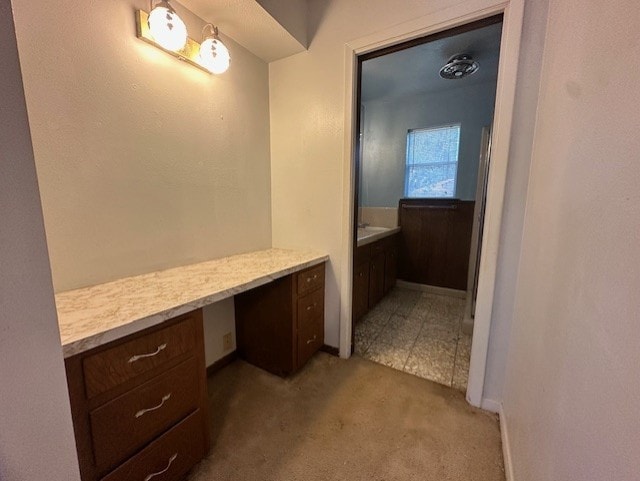1215 Briar Ln, Wharton, TX 77488 - bathroom featuring baseboards and vanity
