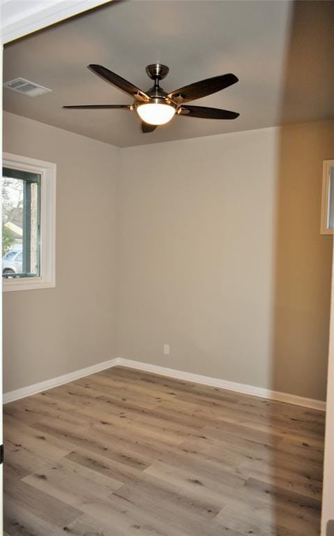 815 Leonard Ave, Richmond, TX 77469 - unfurnished room featuring wood finished floors and ceiling fan