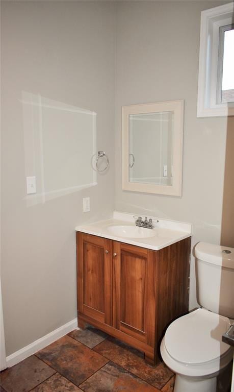 815 Leonard Ave, Richmond, TX 77469 - half bathroom with vanity and stone finish floors