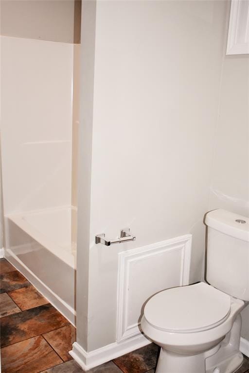 815 Leonard Ave, Richmond, TX 77469 - bathroom featuring toilet and shower / tub combination