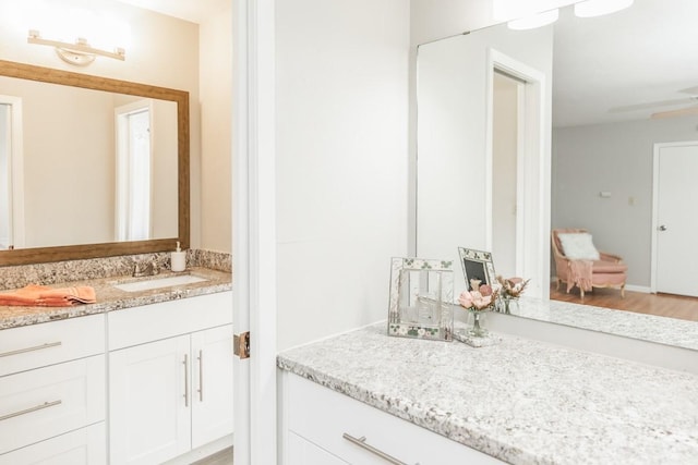 804 Camphor Cir, Village Mills, TX 77663 - bathroom featuring vanity and wood finished floors