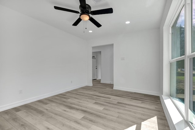 9602 Ballin David Dr, Spring, TX 77379 - spare room with light wood-style floors, recessed lighting, and a ceiling fan