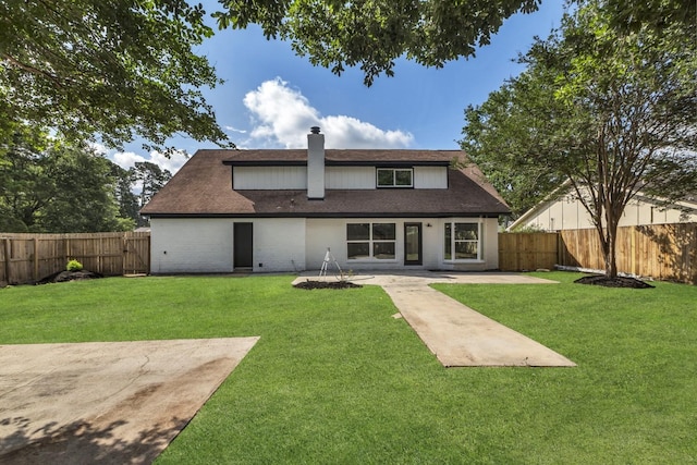 9602 Ballin David Dr, Spring, TX 77379 - back of house with a patio area, a fenced backyard, a chimney, and roof with shingles