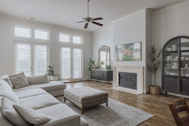 1207 W 25th St, Houston, TX 77008 - living area with a ceiling fan, ornamental molding, wood finished floors, a premium fireplace, and recessed lighting
