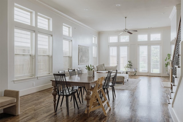 1207 W 25th St, Houston, TX 77008 - dining area featuring healthy amount of natural light, ceiling fan, wood finished floors, ornamental molding, and a high ceiling