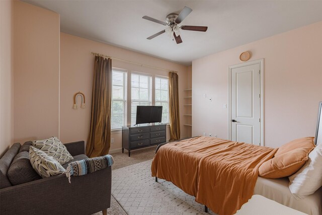 1207 W 25th St, Houston, TX 77008 - bedroom featuring light carpet and ceiling fan