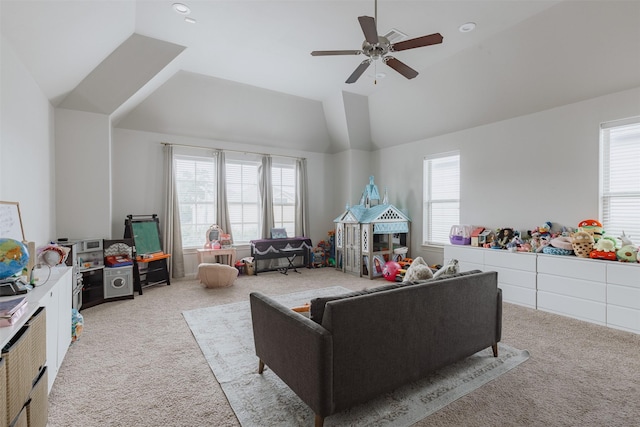 1207 W 25th St, Houston, TX 77008 - living room with light colored carpet, plenty of natural light, ceiling fan, and lofted ceiling