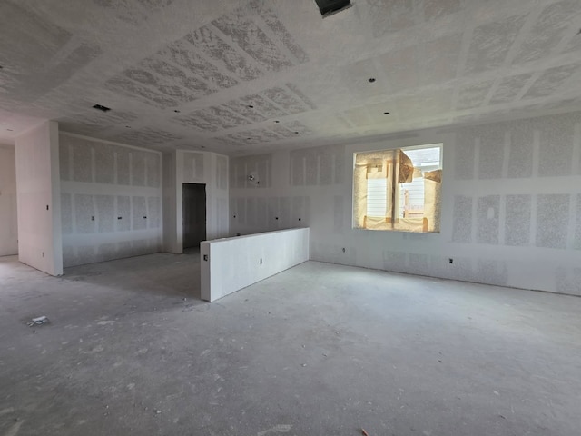 1449 Lake Ridge Dr, Brenham, TX 77833 - spare room featuring concrete floors