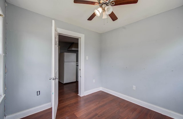 1117 Elliston St, Houston, TX 77023 - spare room featuring dark wood-style floors and a ceiling fan