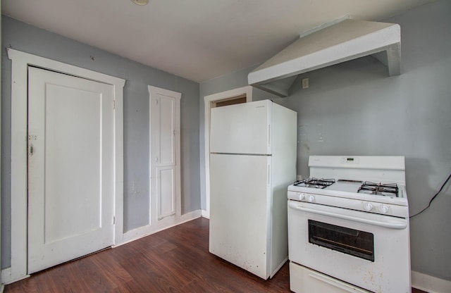 1117 Elliston St, Houston, TX 77023 - kitchen featuring white appliances and dark wood-type flooring