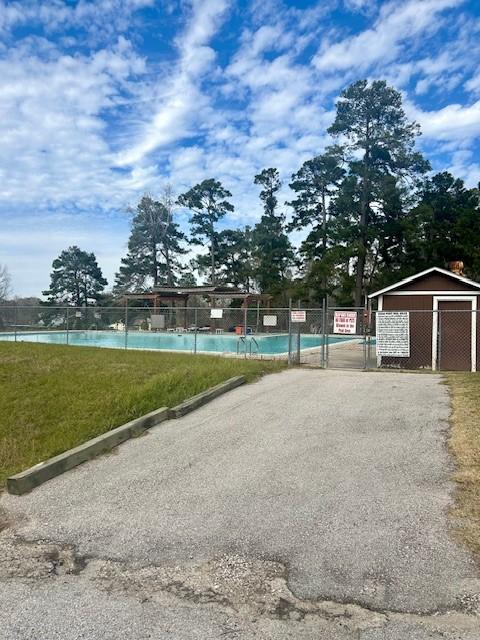 157 Honeysuckle, Livingston, TX 77351 - view of community pool