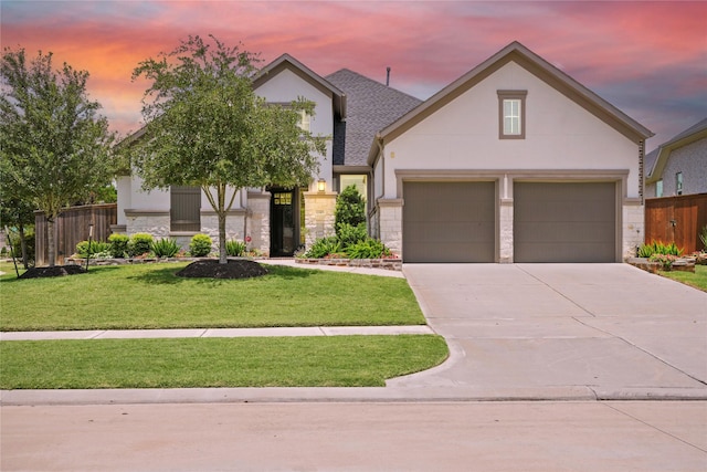13305 Newcastle Creek Ct, Houston, TX 77059 - view of front of house with stone siding, stucco siding, driveway, and roof with shingles