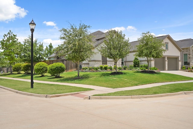 13305 Newcastle Creek Ct, Houston, TX 77059 - obstructed view of property featuring stucco siding, driveway, and stone siding
