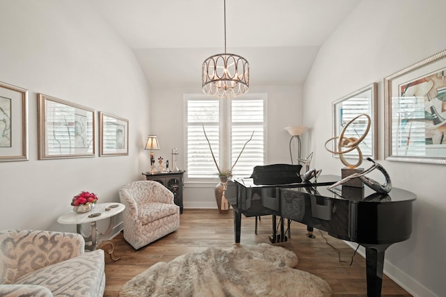 13305 Newcastle Creek Ct, Houston, TX 77059 - living area with vaulted ceiling, a chandelier, and wood finished floors